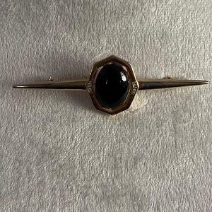 Gold Brooches
